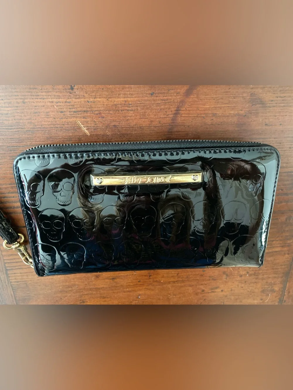 Betsey Johnson Black Patent Skull-Embossed Zip Wallet with Gold Plaque